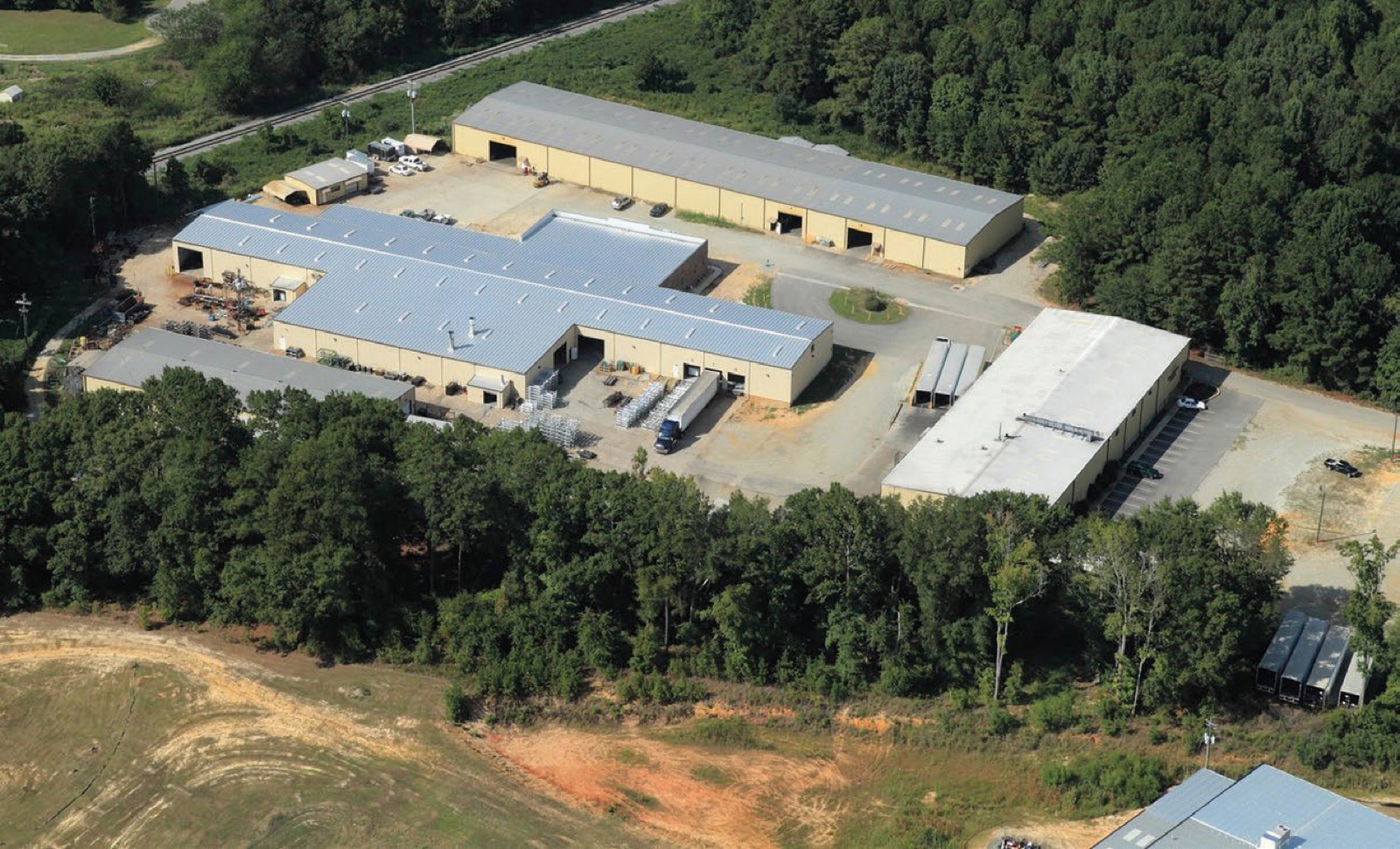 Aerial view of Southern Perfection Fabrication's roughly 100,000 sq ft metal fabrication facility in Byron, Georgia
