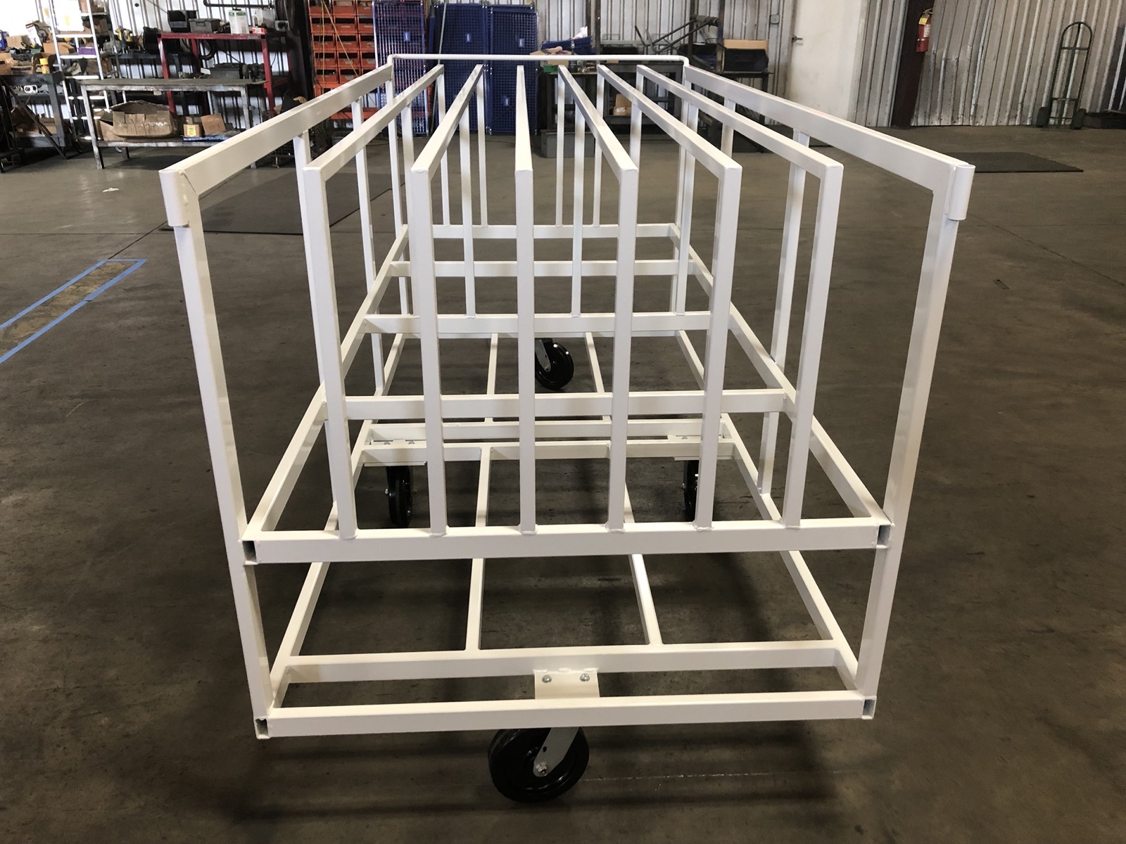 Custom powder-coated industrial cart built by Southern Perfection Fabrication